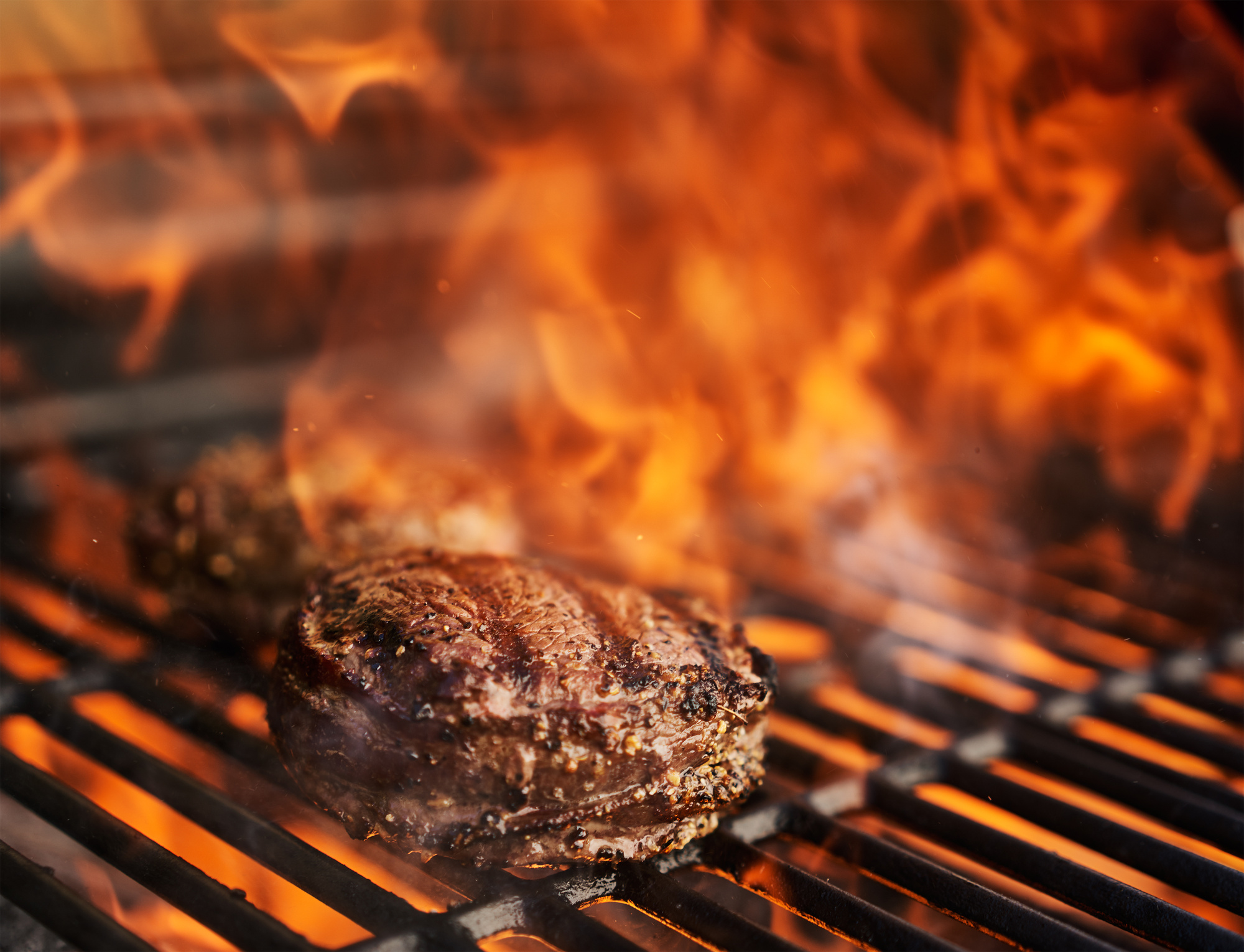 Steak on Flaming Grill 